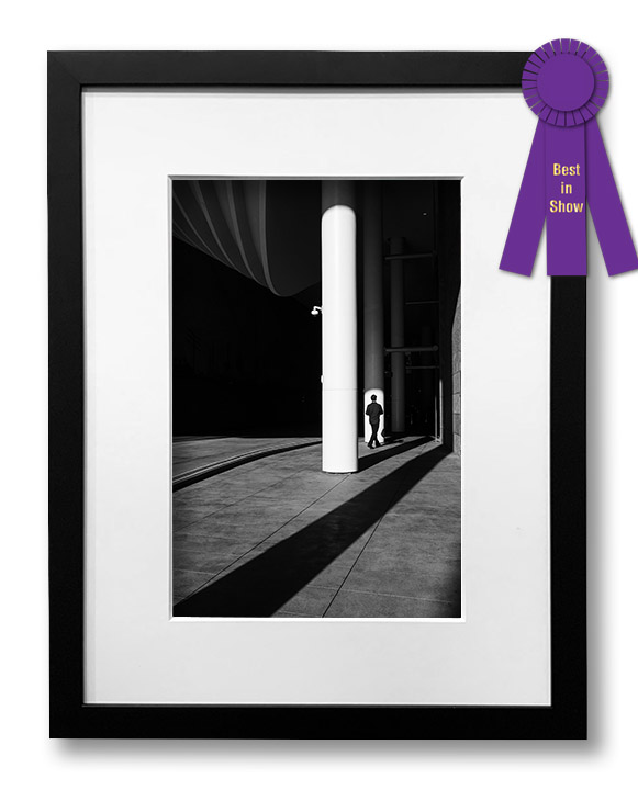 Framed black & white photo with award ribbon